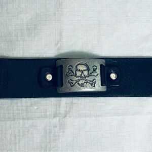 Black Leather Wrist Cuff With Metal Skull Adjustable To 2 Wrist Size 14 Or 16